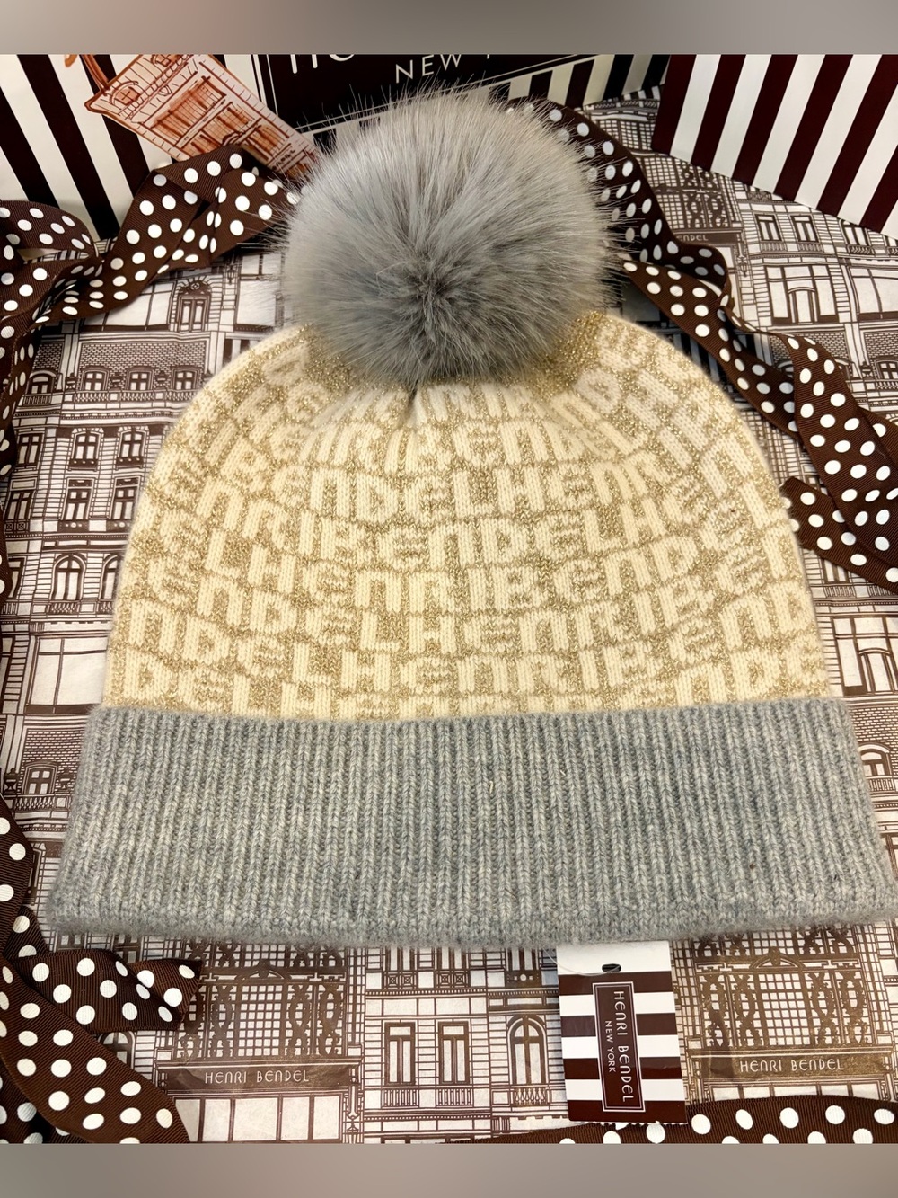 NET HENRI BENDEL Gold Sparkle Cashmere
Beanie w/Faux Fur. Light blue/gray & gold